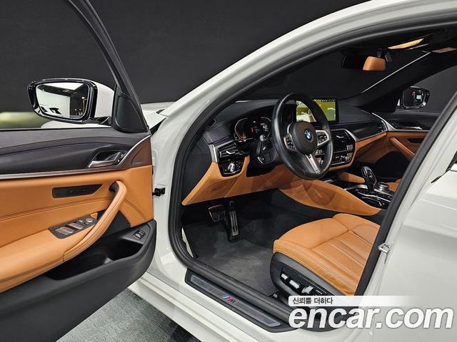 BMW 5 Series 2023 — фото 10
