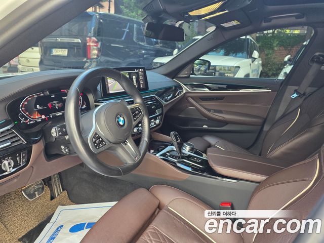 BMW 5 Series 2023 — фото 10