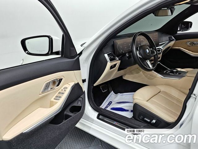 BMW 3 Series 2023 — фото 10