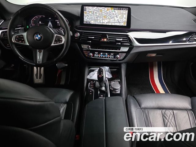 BMW 5 Series 2023 — фото 10