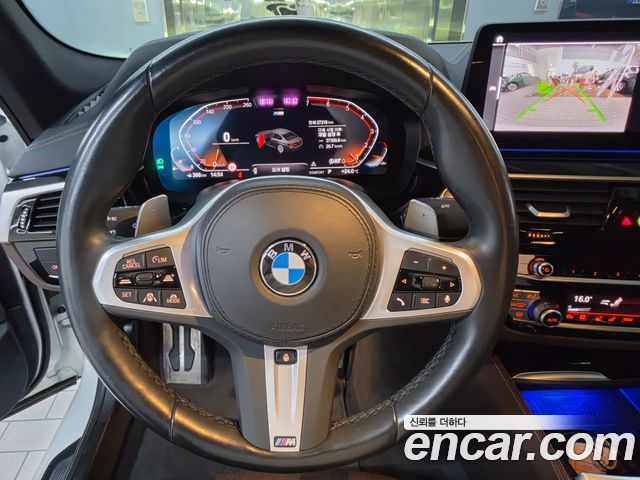 BMW 5 Series 2023 — фото 10