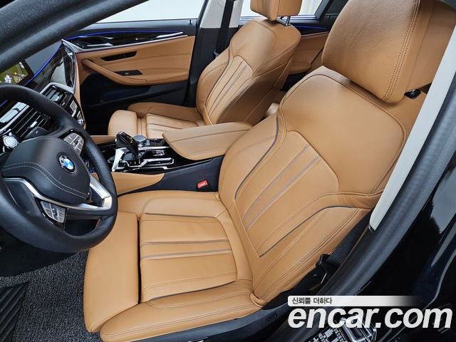 BMW 5 Series 2023 — фото 10