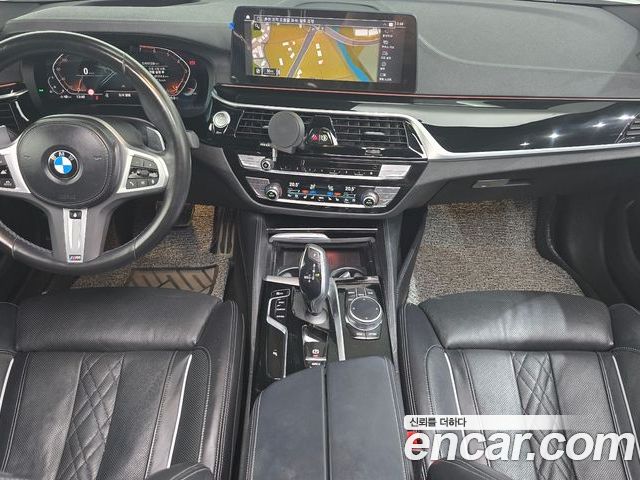 BMW 5 Series 2023 — фото 10