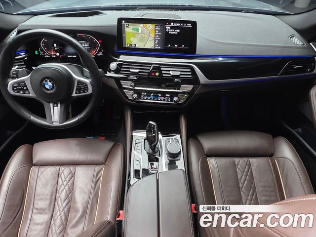 BMW 5 Series 2023 — фото 10