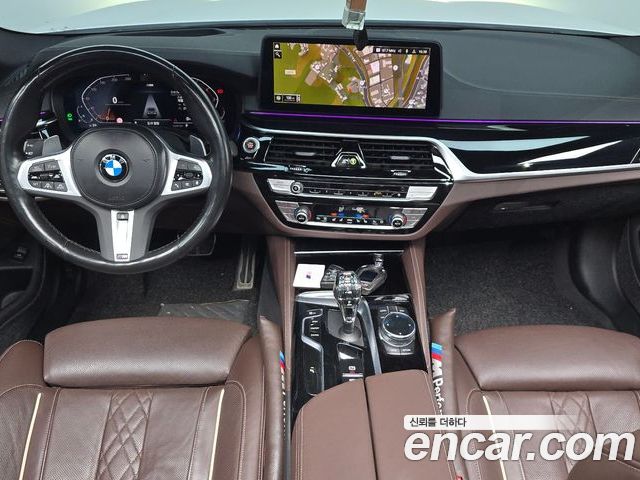 BMW 5 Series 2023 — фото 10